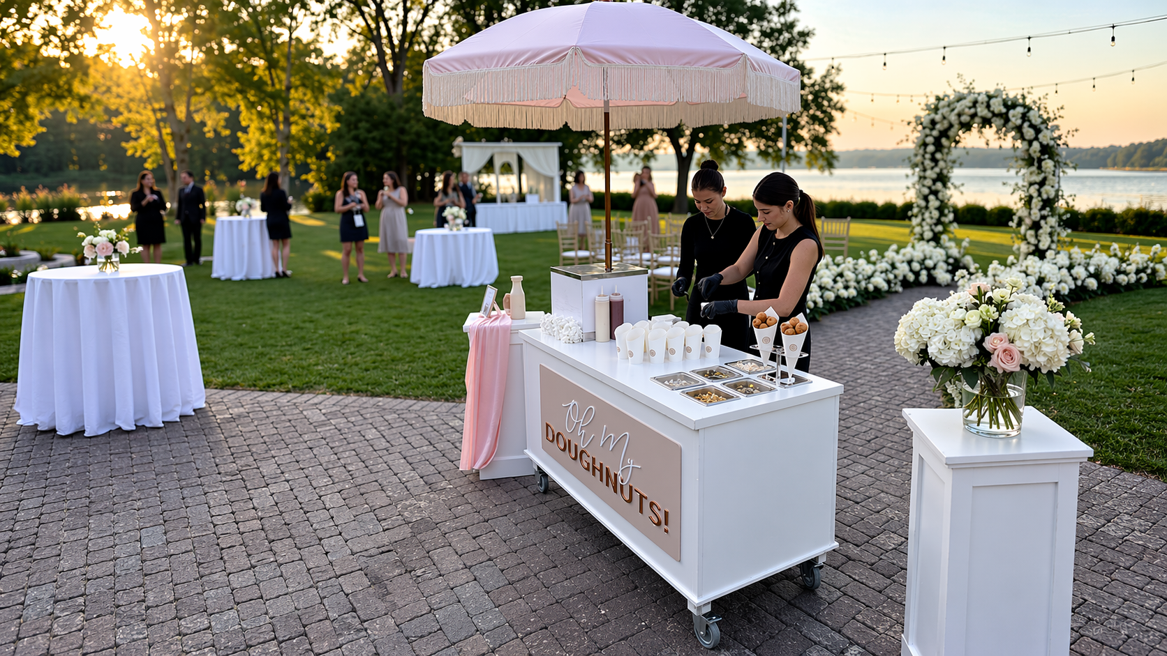 Oh My Doughnuts live mini doughnut cart at an outdoor wedding near Ottawa