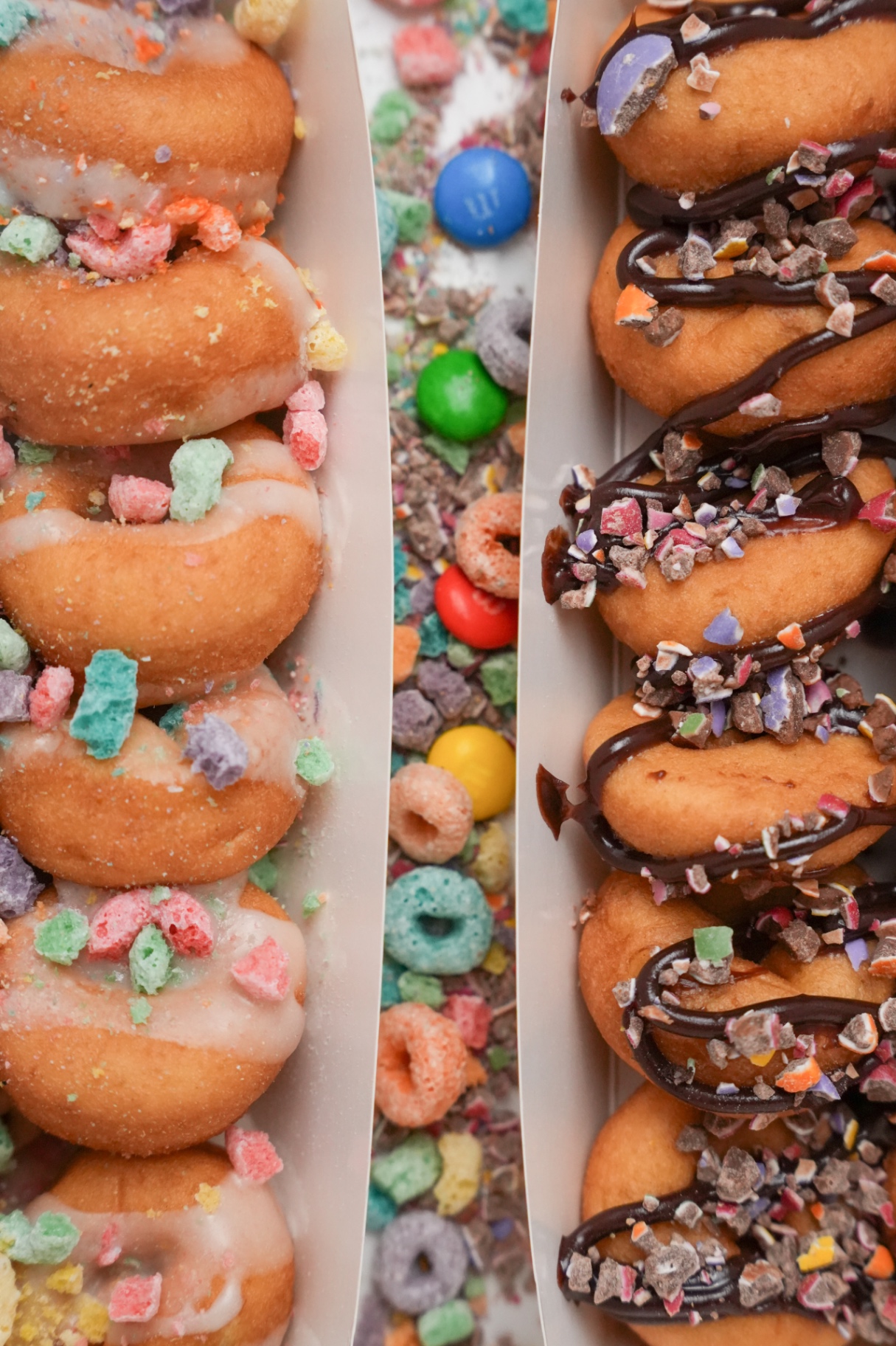 Colourful mini doughnuts with pink toppings
