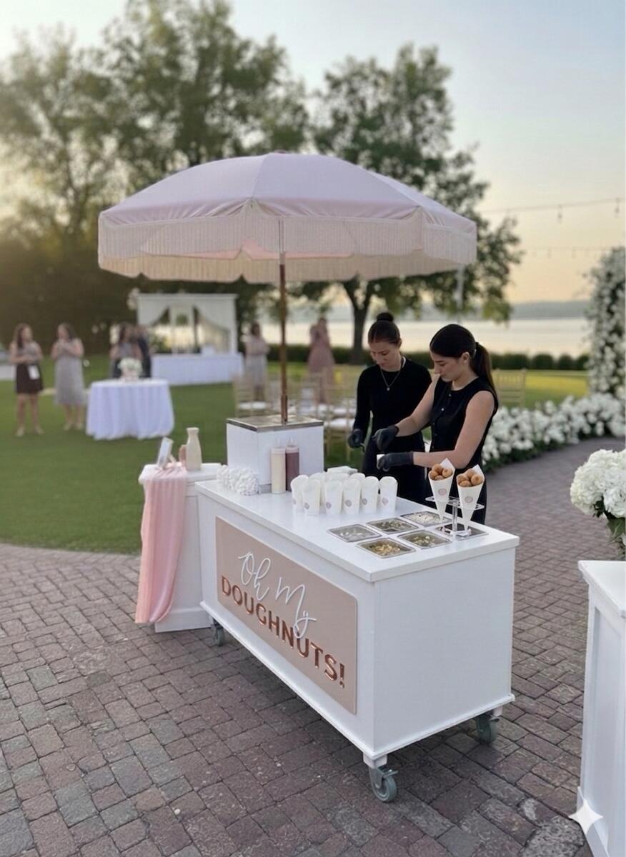 Tray of glazed mini doughnuts at a wedding
